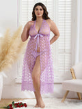 Plus size woman wearing a lilac 3D butterfly mesh halter maxi gown set with matching brief