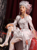 Silver gray haunted bride Halloween costume with bridal veil, lace-up waist cincher and layered dress